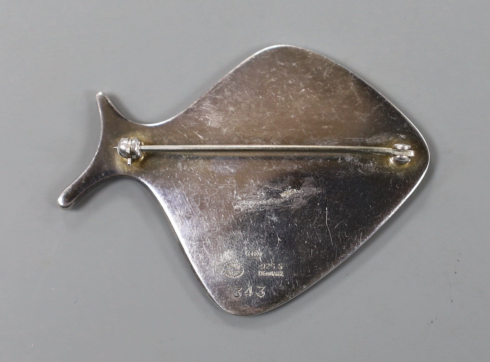 A Georg Jensen sterling and enamel stylised fish brooch, design no. 343, 58mm.